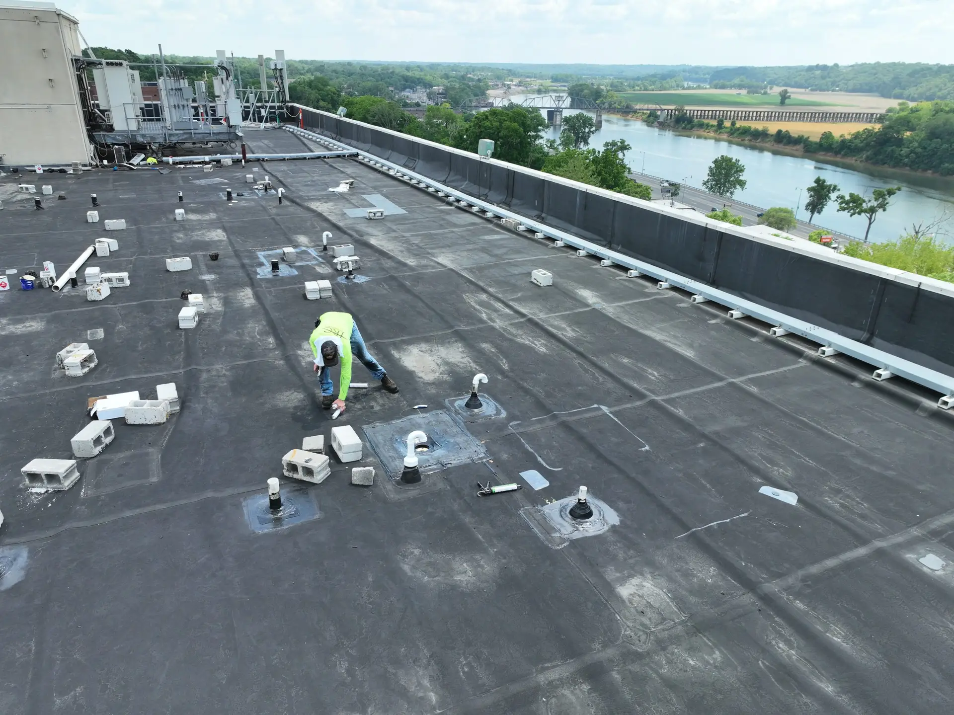 Image of JRC employee conducting roof repair